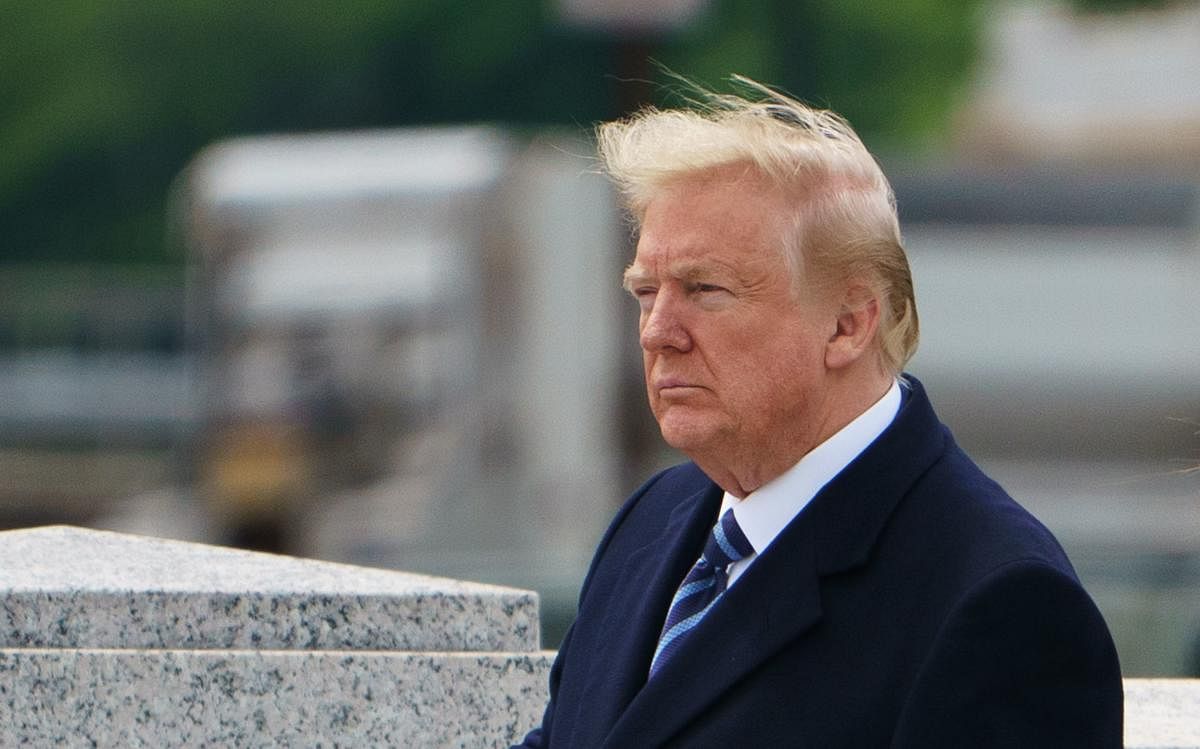 US President Donald Trump takes part in a ceremony commemorating the 75th anniversary of Victory in Europe Day at the World War II Memorial in Washington, DC on May 8, 2020. Credit: AFP Photo