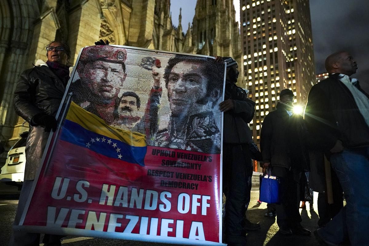 Demonstrators In Support Of Venezuelan President Maduro Protest Outside The Venezuelan Consulate In New York City. AFP