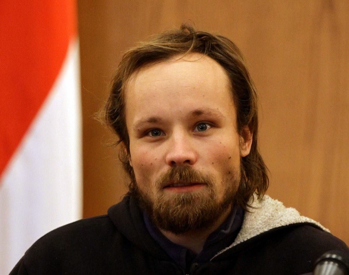 In this file picture taken on March 5, 2013 German independent journalist Billy Six, whose employers said had been out of contact for almost four months, is pictured during a press conference in Damascus were he was handed over to the Russian embassy by S