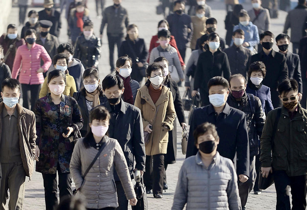 People wearing protective face masks commute amid concerns over the new coronavirus disease (COVID-19) in Pyongyang, North Korea March 30, 2020, in this photo released by Kyodo. Credit: Reuters Photo