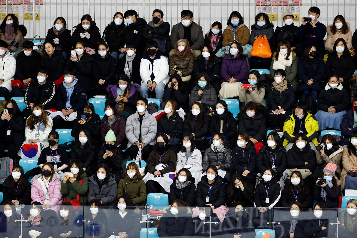 Spectators wear masks to prevent contacting a new coronavirus during Four Continents Figure Skating Championships 2020 in Seoul. Credit: Reuters Photo