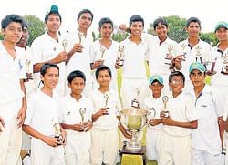 Players of St Josephs (State) High School with Dell- KSCA&#8200;trophy in Mysore on Sunday. dh photo