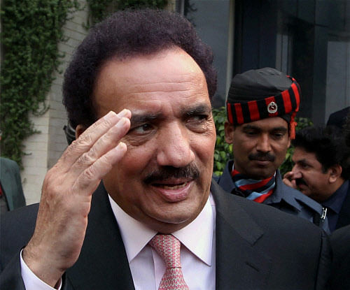 Pakistan's Interior Minister Rehman Malik leaves after an interaction organised by Observer Research Foundation (ORF) in New Delhi on Sunday. PTI Photo Kamal Singh