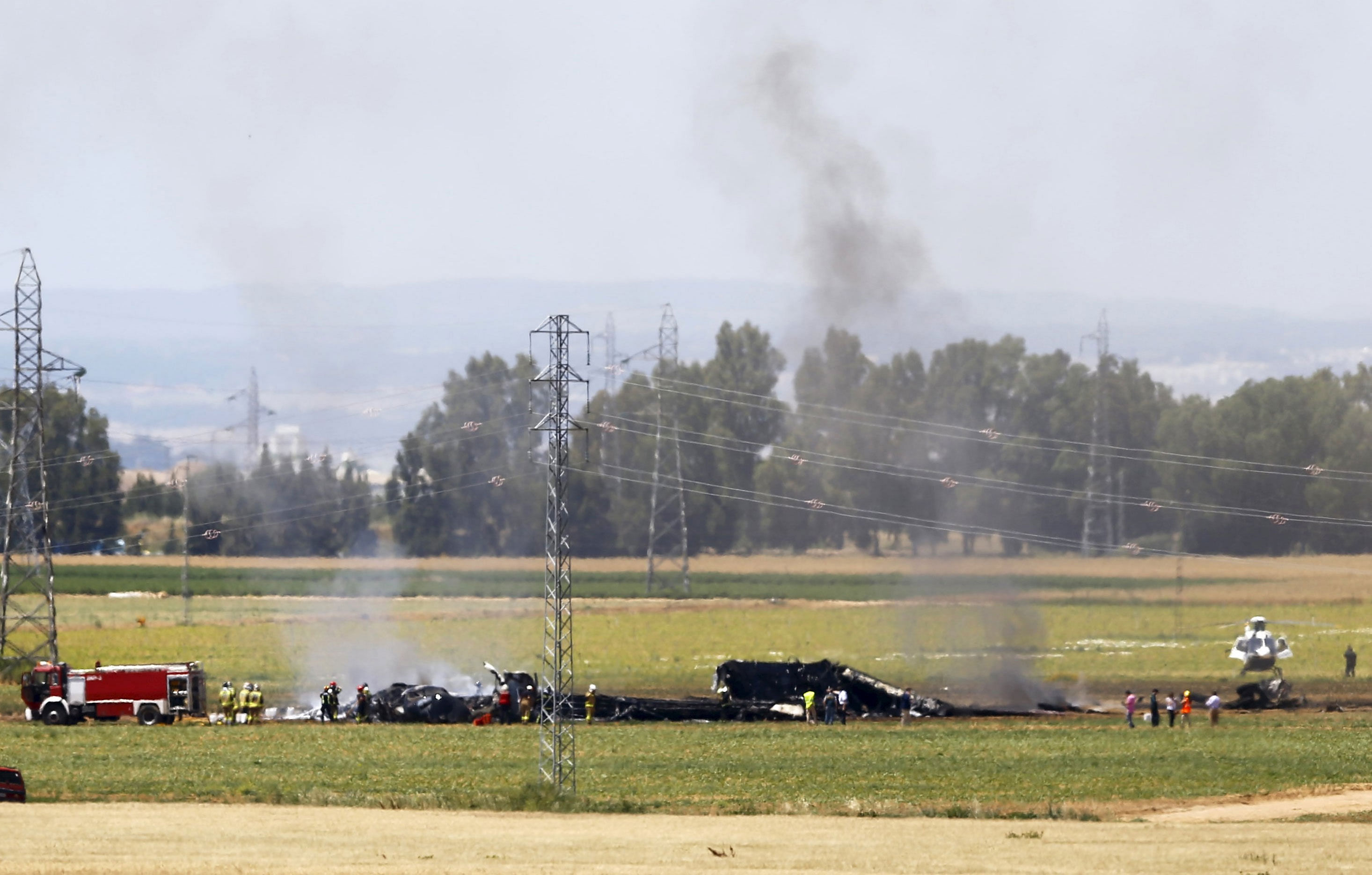 The remains of Airbus A400M are seen after crashing in a field near the Andalusian capital of Seville May 9, 2015.  Reuters Photo.