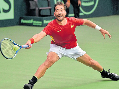 within reach Spain's Marc Lopez returns one en route to his win over Sumit Nagal of India at the R&#8200;K Khanna stadium in New Delhi on Sunday. PTI