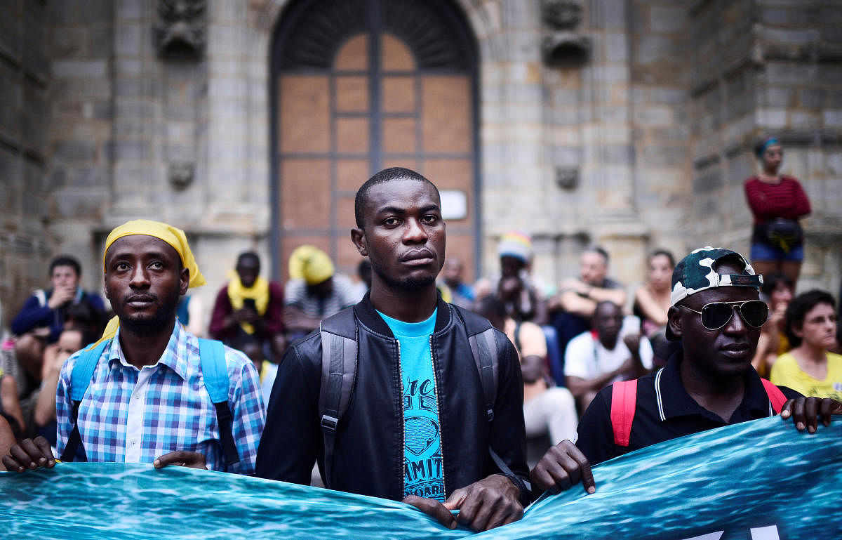 African migrants take part in a pro-refugee demonstration organised by the Basque NGO Ongi Etorri Errefuxiatuak (Welcome Refugees) in Bilbao, Spain, July 24, 2018. REUTERS