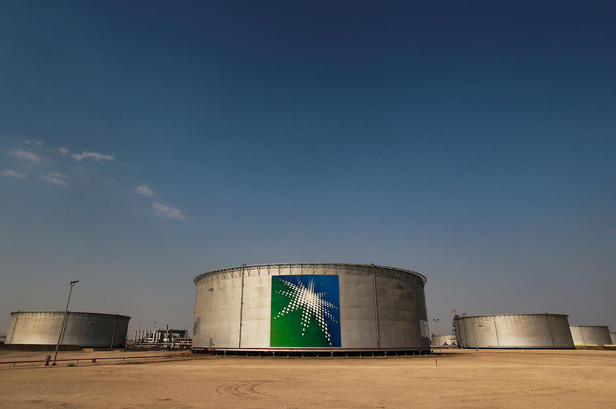 In theory, Saudi Aramco has to pay about $75 billion in dividends to the Saudi government after its initial public offering last year but analysts say its free cash flow is not expected to cover that amount. (Reuters)