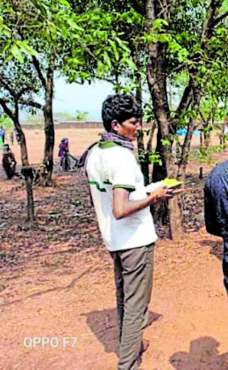 A file photo of Dennis receiving food from an NGO during the lockdown near Polali Cross on Mangaluru’s outskirts.