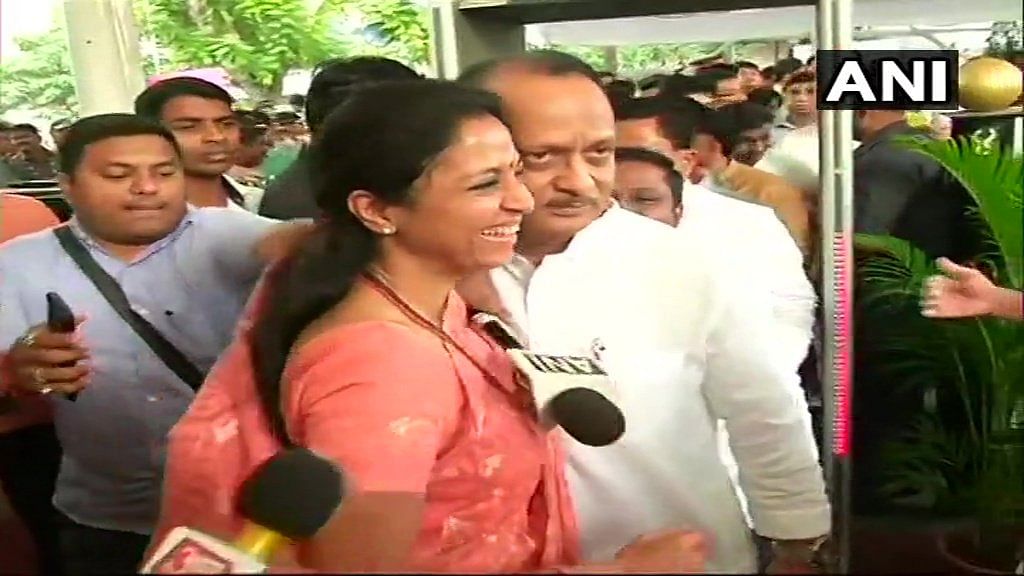 NCP leader Supriya Sule welcomed Ajit Pawar at Maharashtra Assembly.(Photo: ANI)