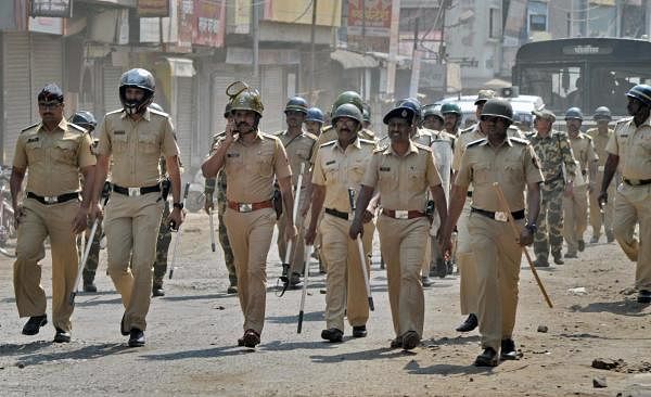 Police officials patrolling after Dalits called for Maharashtra Bandh as a protest over Bhima Koregaon violence, at Sangli in Maharashtra. (PTI Photo)