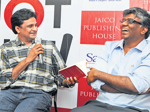Former India pacer J Srinath (left) and Harimohan during the release of latter's book 50 Not Out on Monday. DH PHOTO