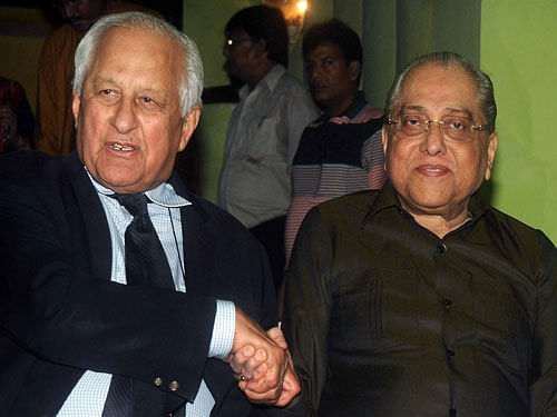 BCCI(Board of Control for Cricket in India) President Jagmohan Dalmiya shakes hand with PCB(Pakistan Cricket Board) Chairman Shahryar Khan after their closed door meeting for the upcoming India-Pakistan cricket series, at his residence in Kolkata Sunday. PTI Photo