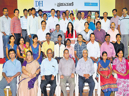 celebration time Winners of the DH & PV Cricket Mania Contest with guests of the evening - Asadulla Baig, Richard Louis and Mythriya Gowda (all seated in the back row, from left) - at a function in Bengaluru on Thursday. DH Photo