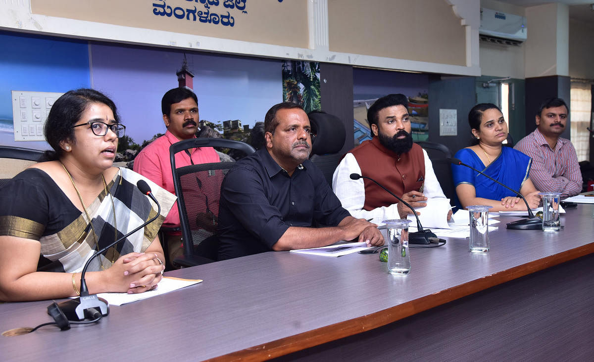 Minister for Health and Family Welfare B Sriramulu chairs a review meeting  at DC’s office in Mangaluru on Tuesday. DH Photo