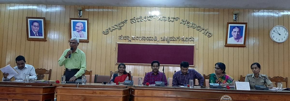 DDPI C Nanjaiah speaks during a meeting at Zilla Panchayat in Chikkamagaluru.