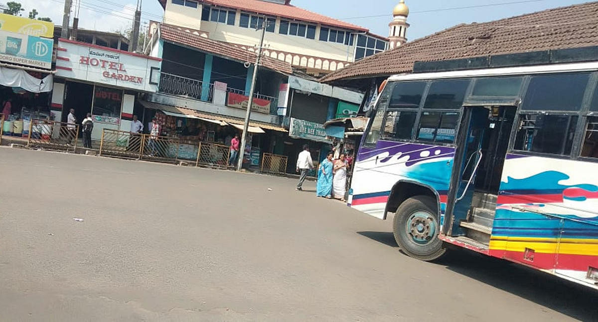 Private bus stand wears a deserted look in Virajpet.