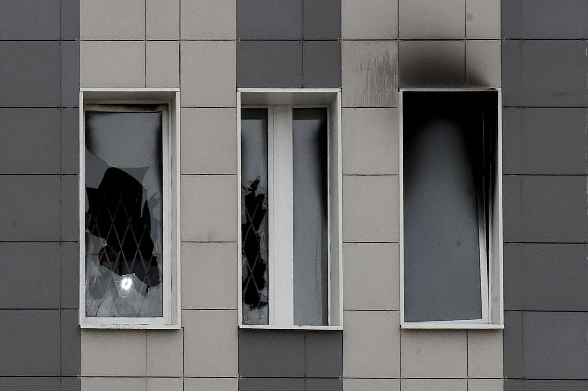 Damaged windows are seen after a fire broke out in the Saint George hospital in Saint Petersburg. AFP