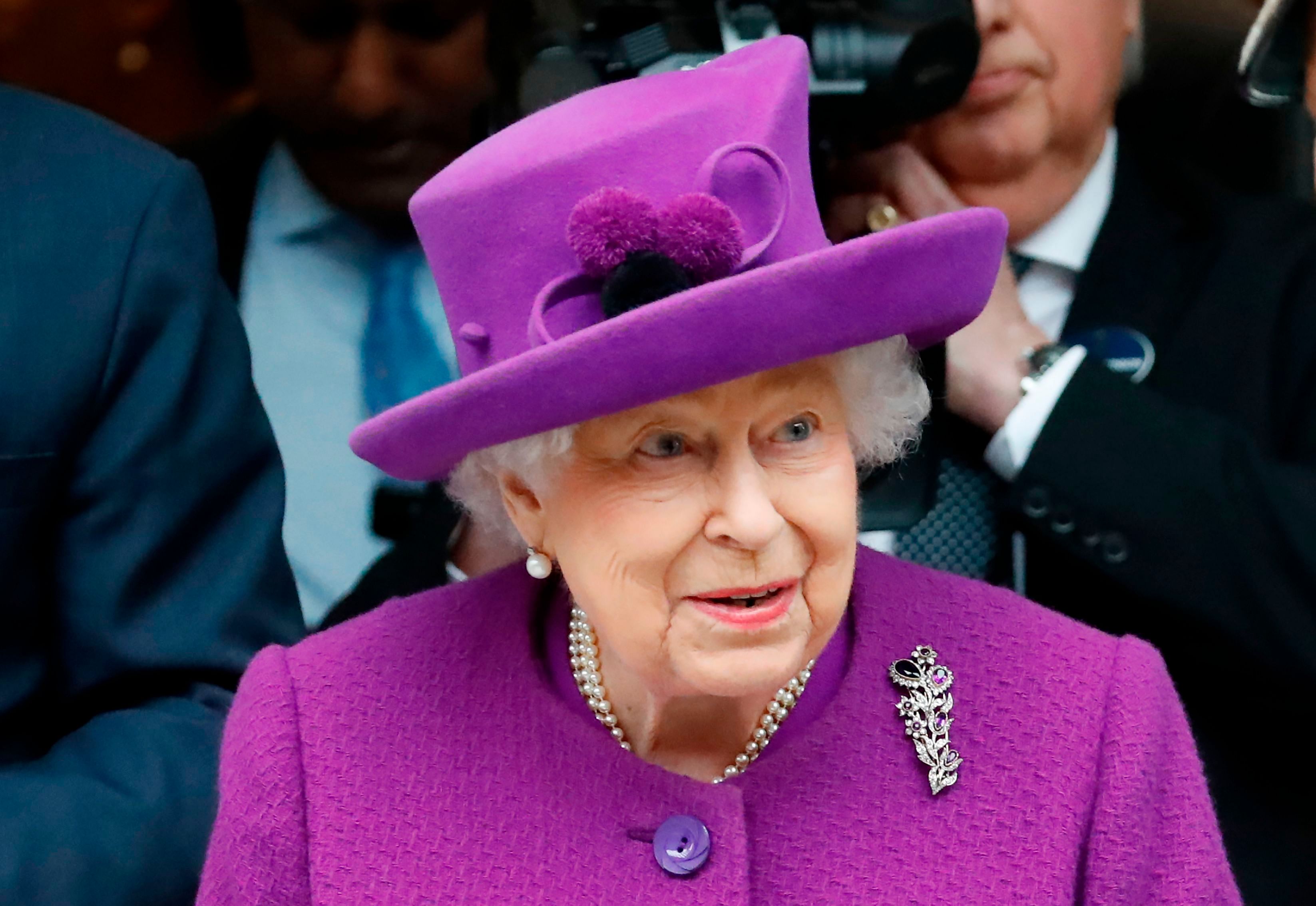 The queen, 93, is currently at Windsor Castle, her home to the west of London, with her husband, 98-year-old Prince Philip, and a small number of staff.(Credit: AFP Photo)