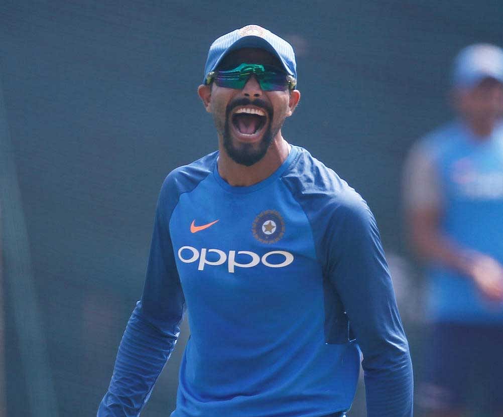Ravindra Jadeja reacts after bowling in the nets. REUTERS