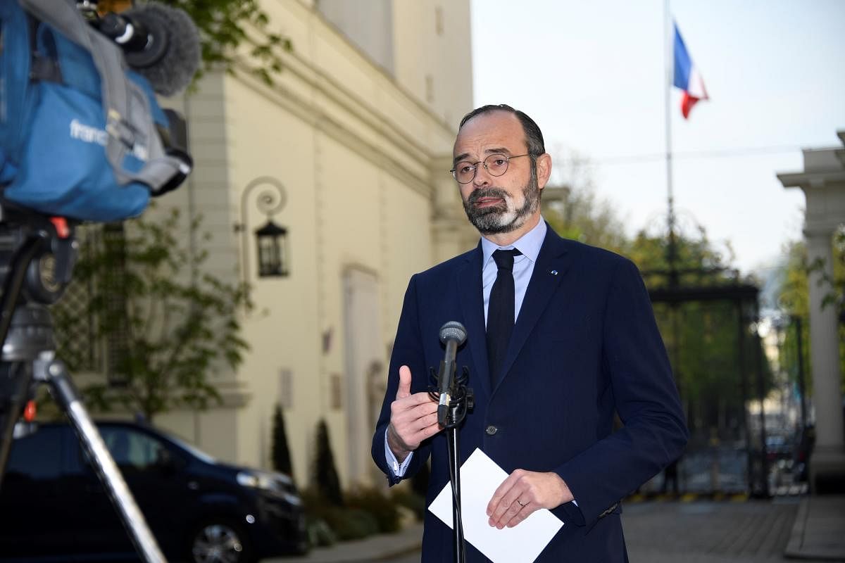French Prime Minister Edouard Philippe speaks to the press at the interministerial crisis coordination unit. AFP