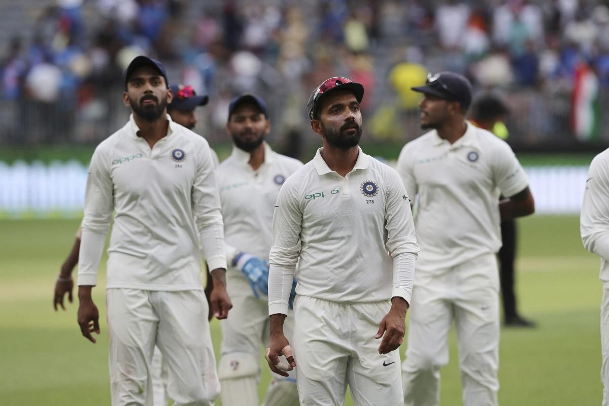 Ajinkya Rahane, second right, leads his teammates off the ground at the conclusion of the third days play in the second cricket test between Australia and India in Perth, Australia, Sunday, Dec. 16, 2018. AP/PTI