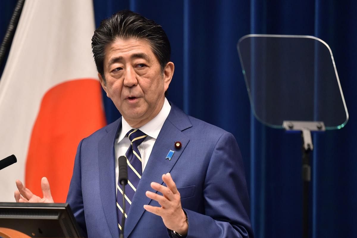 Japan's Prime Minister Shinzo Abe delivers a speech during a press conference at the prime minister's office in Tokyo. AFP