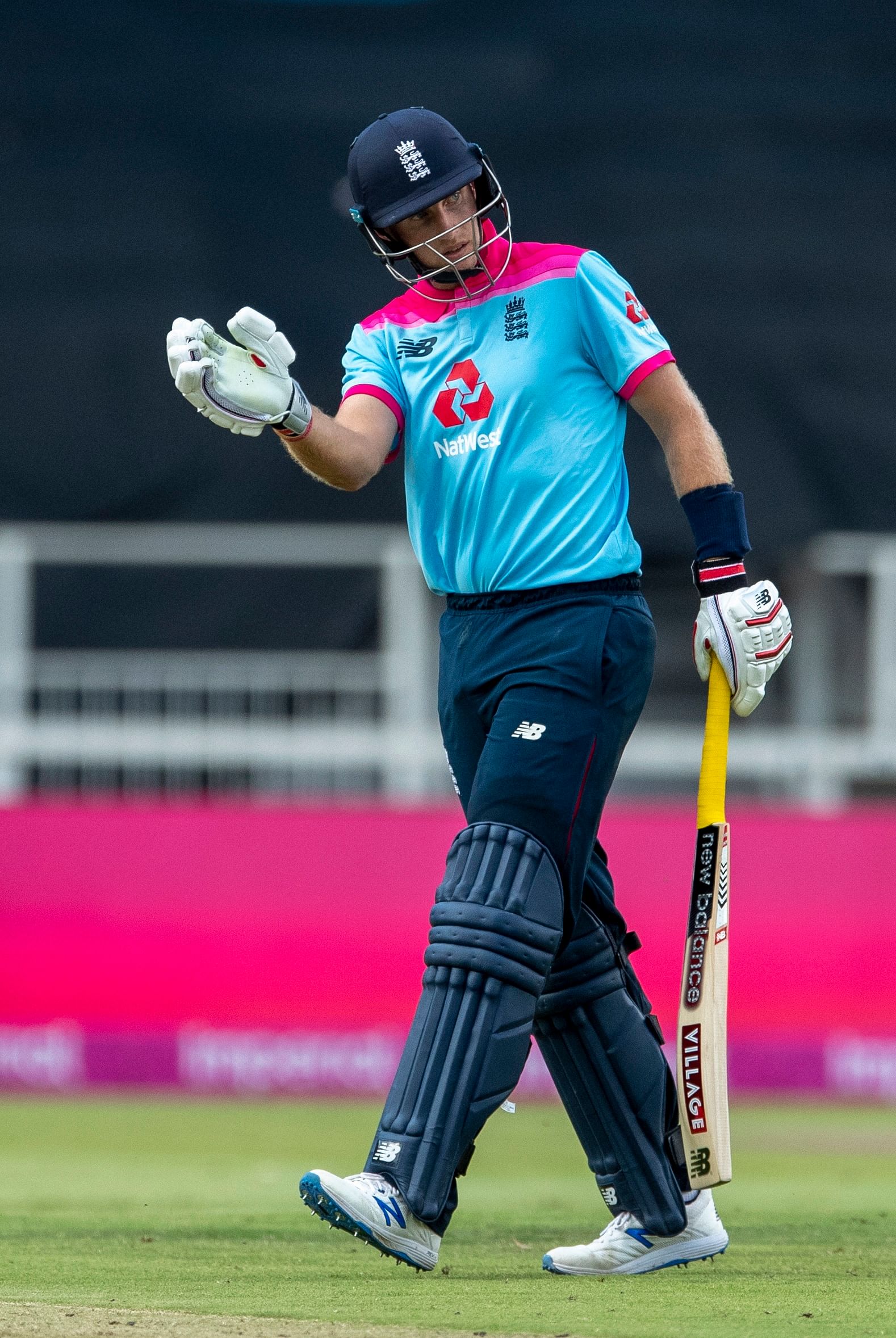  England's batsman Joe Root leaves the field after being dismissed by South Africa's bowler Tabraiz Shamsi. (Credit: AP Photo)