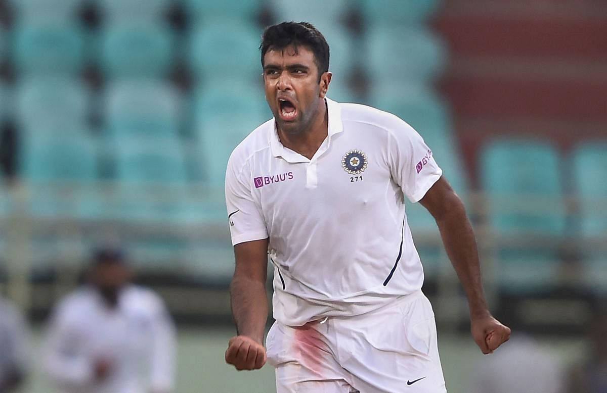 India's Ravichandran Ashwin celebrates the dismissal of South Africa's Quinton de Kock on third day of the 1st cricket test match between India and South Africa at Dr YS Rajasekhara Reddy ACA-VDCA Cricket Stadium, in Visakhapatnam on Friday. (PTI Photo)