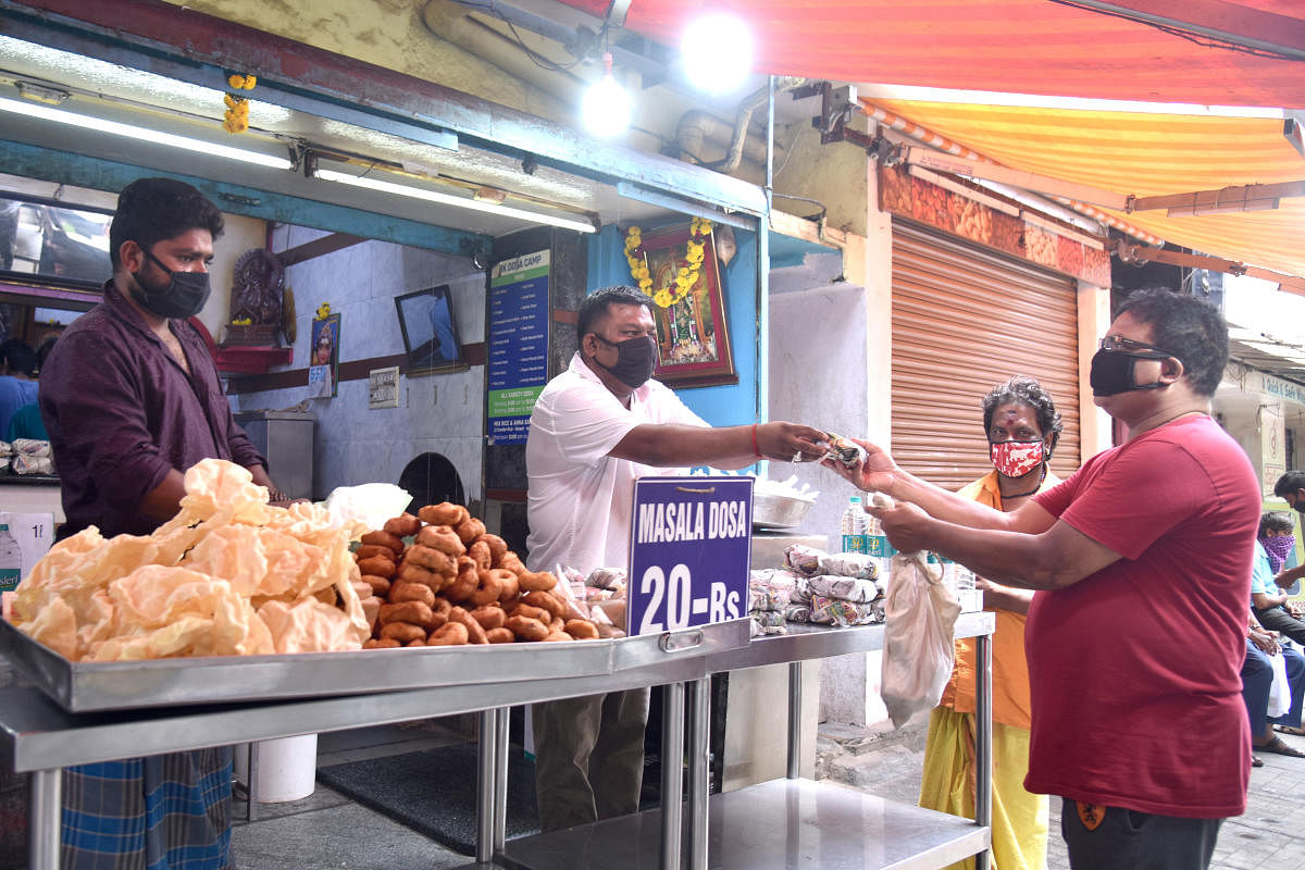 R K Dosa Camp has reduced the price of masala  dosa from Rs 30 to Rs 20. DH Photos by SK Dinesh