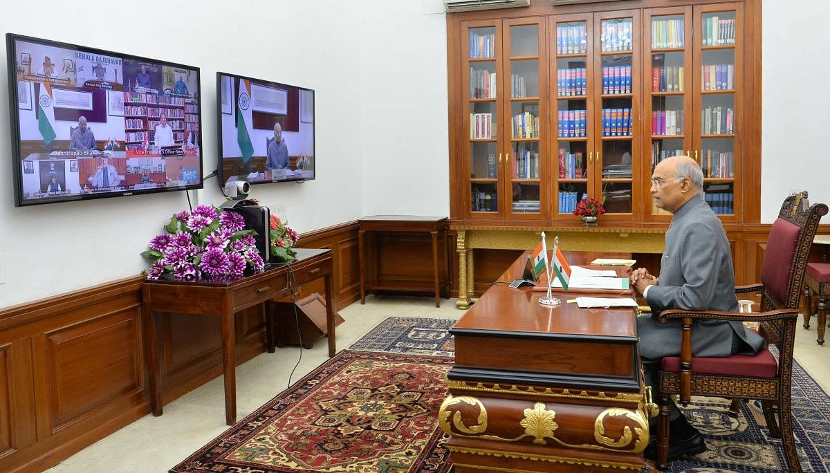 President Ram Nath Kovind along with Vice President Venkaiah Naidu, interacts with the Governors, Lt Governors and Administrators of all the States and Union Territories via video conferencing, on issues related to COVID-19, at Rashtrapati Bhavan in New Delhi, Friday, March 27, 2020. (PTI Photo)