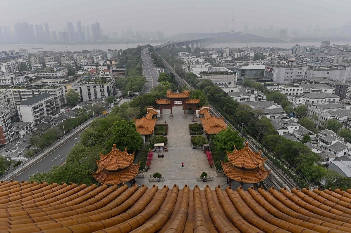 View of Wuhan city from the Yellow Crane Tower in Wuhan, in China's central Hubei province. (Photo by AFP)