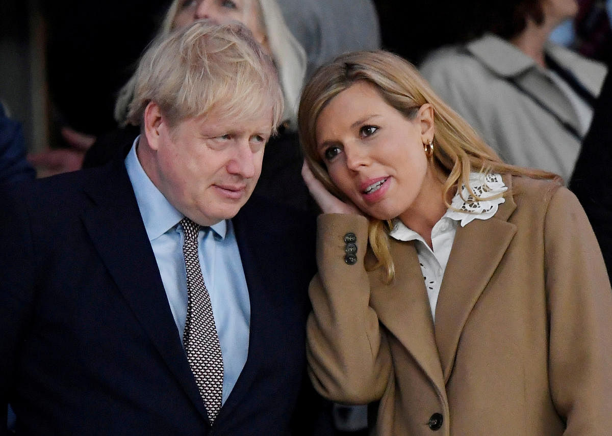 Britain's Prime Minister Boris Johnson with his partner Carrie Symonds. Reuters/File