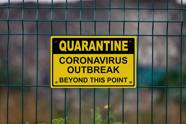 Warning sign on a fence stating in "Quarantine - Coronavirus beyond this point "(iStock Photo)