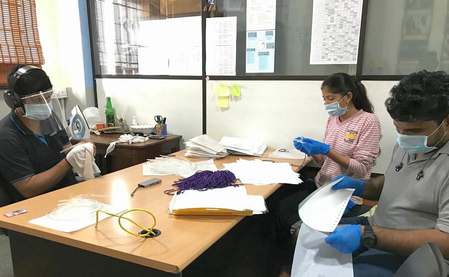 Students at work on face shields at the Sahyadri College of Engineering and Management in Mangaluru. Credit: DH Photo