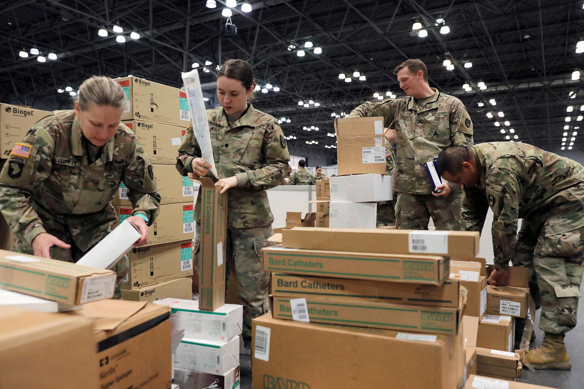U.S. Army Medical Personnel from the 531st Hospital Center out of Fort Campbell, Kentucky and the 9th Hospital Center out of Fort Hood, Texas unpack medical equipment. Reuters