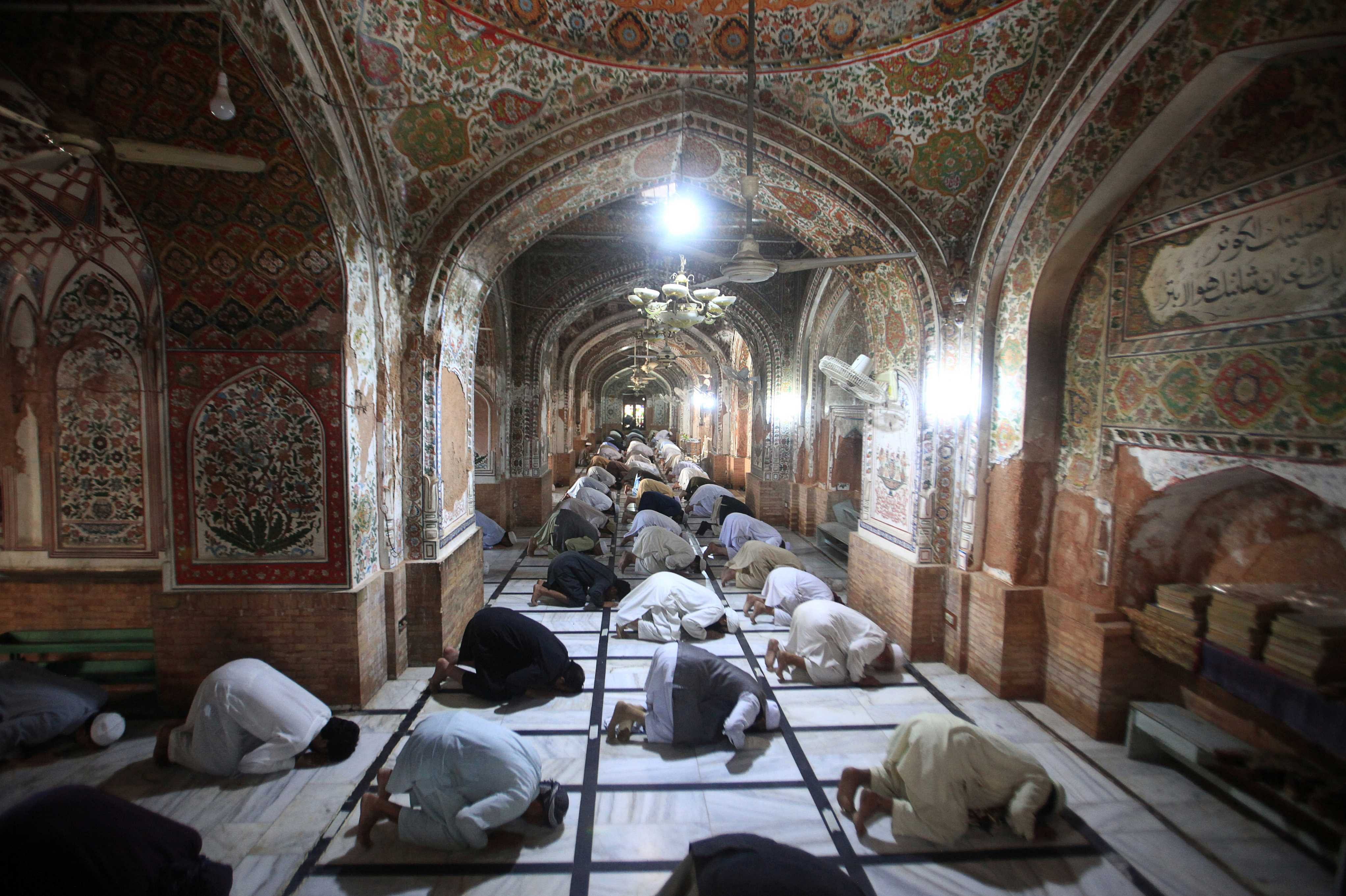 Muslims maintain safe distance as they attend a Friday prayer  in Peshawar (Reuters photo)