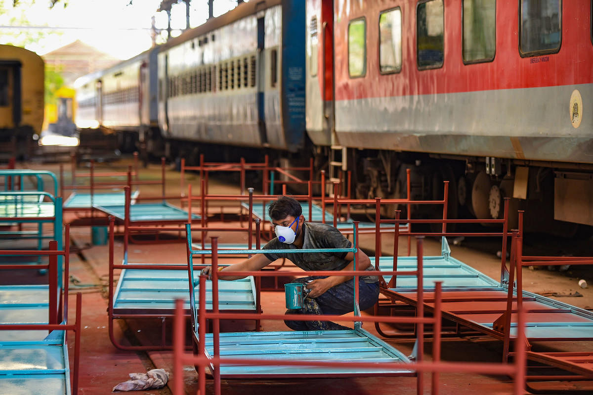 Southern Railway zone (SR) worker prepares beds for an isolation ward of Railway Hospital in the view of coronavirus outbreak, during a nationwide lockdown, in Chennai, Monday, March 30, 2020. (PTI Photo)