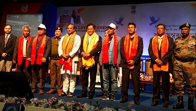 Leaders of four NDFB factions with Assam Chief Minister Sarbananda Sonowal in Guwahati on Thursday, after laying down their weapons. (DH photo)