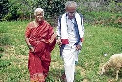 Freedom fighter P Ramappa Naidu walking in his garden at Rayalpad with his wife Subbamma. DH Photos