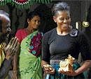 Michelle Obama emerges from a handicraft museum in New Delhi on Monday. AP
