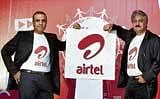 Bharti Airtel Chairman & Managing Director Sunil Bharti Mittal (left) with CEO (India & South Asia) Sanjay Kapoor unveiling the companys new logo, in New Delhi, on Thursday. PTI