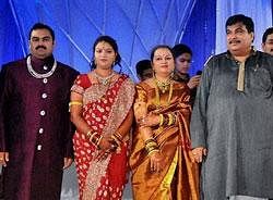 BJP President Nitin Gadkari and his wife with their son Nikhil and daughter in-law Rutuja Patha at the reception after their marriage ceremony in Nagpur on Friday. PTI