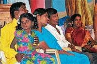 Rapt attention: Couples participating at the Cultural Confluence programme for the visually impaired at Town Hall, in Mysore on Monday. DH photo