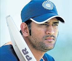 MS Dhoni during a training session at Durban  on Saturday. AP