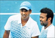 Strategy Time Mahesh Bhupathi and Leander Paes during their win over Spain's Feliciano Lopez and Argentine Juan Monaco in the Australian Open on Saturday. Reuters