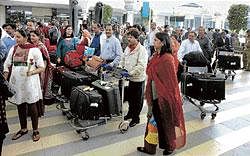 BACK HOME: Indians after their arrival in Mumbai on Monday on a special flight from Cairo. PTI