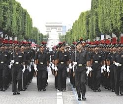 Indian Army guest-troops march down the Champs Elysees avenue during a rehearsal for Bastille Day parade, in Paris. AFP