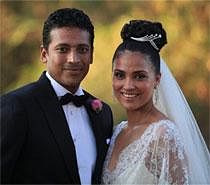 Tennis Star Mahesh Bhupati and Bollywood actress Lara Dutta pose after their wedding in Goa on Saturday. The couple had registered their marriage in Mumbai and later held a grand wedding at a five star resort in Goa. PTI Photo