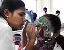 CREATIVE Face painting competition in progress.