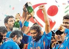 Indian players rejoice after beating Sri Lanka in the World Cup final at the Wankhede stadium in Mumbai on Saturday. AFP